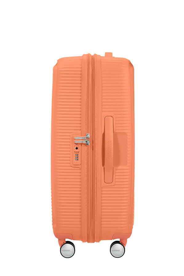 SoundBox Walizka Średnia | American Tourister Soundbox Spinner TSA Expandable 67cm  Cantaloupe